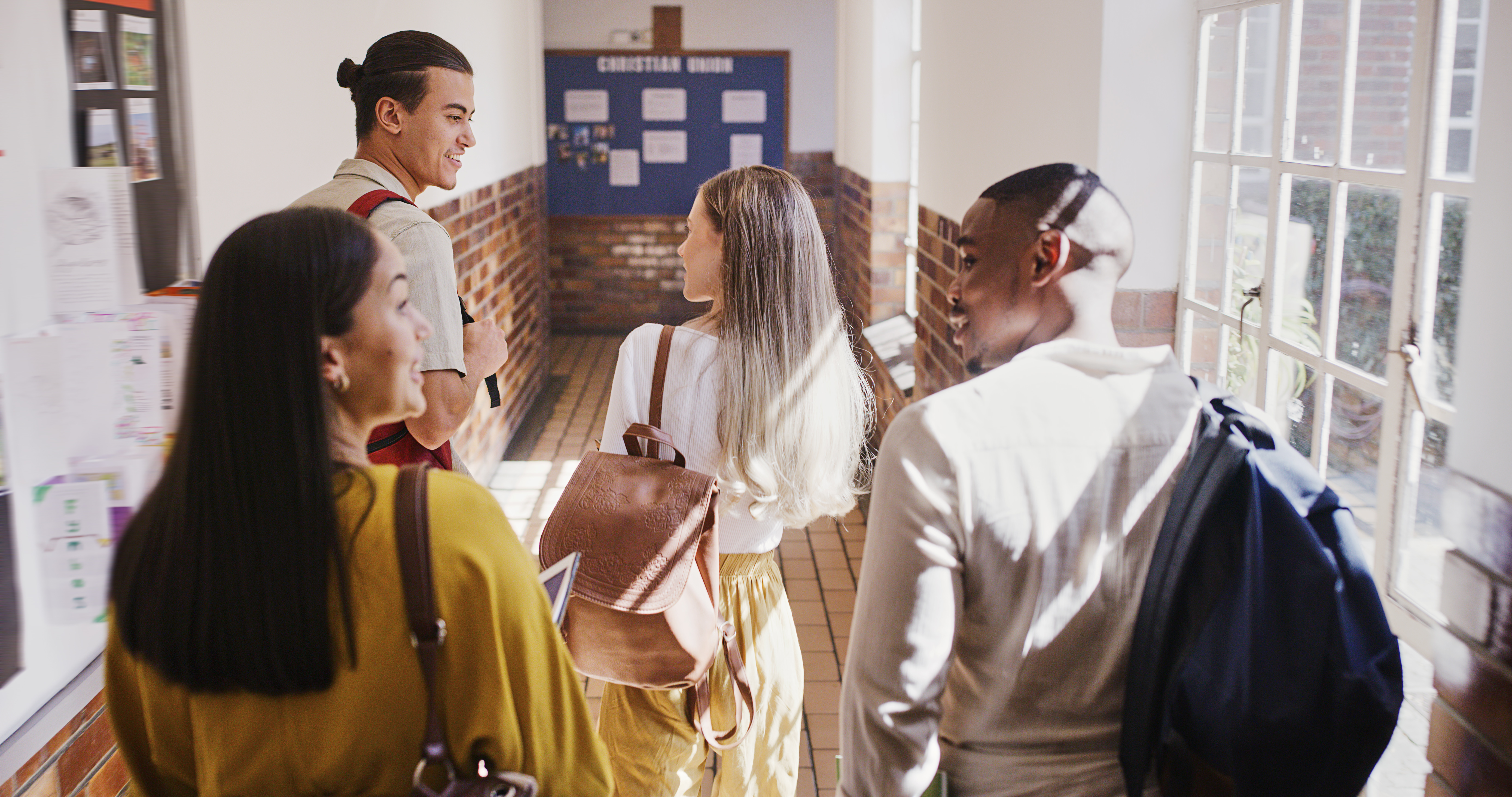 Students walking in a hallway