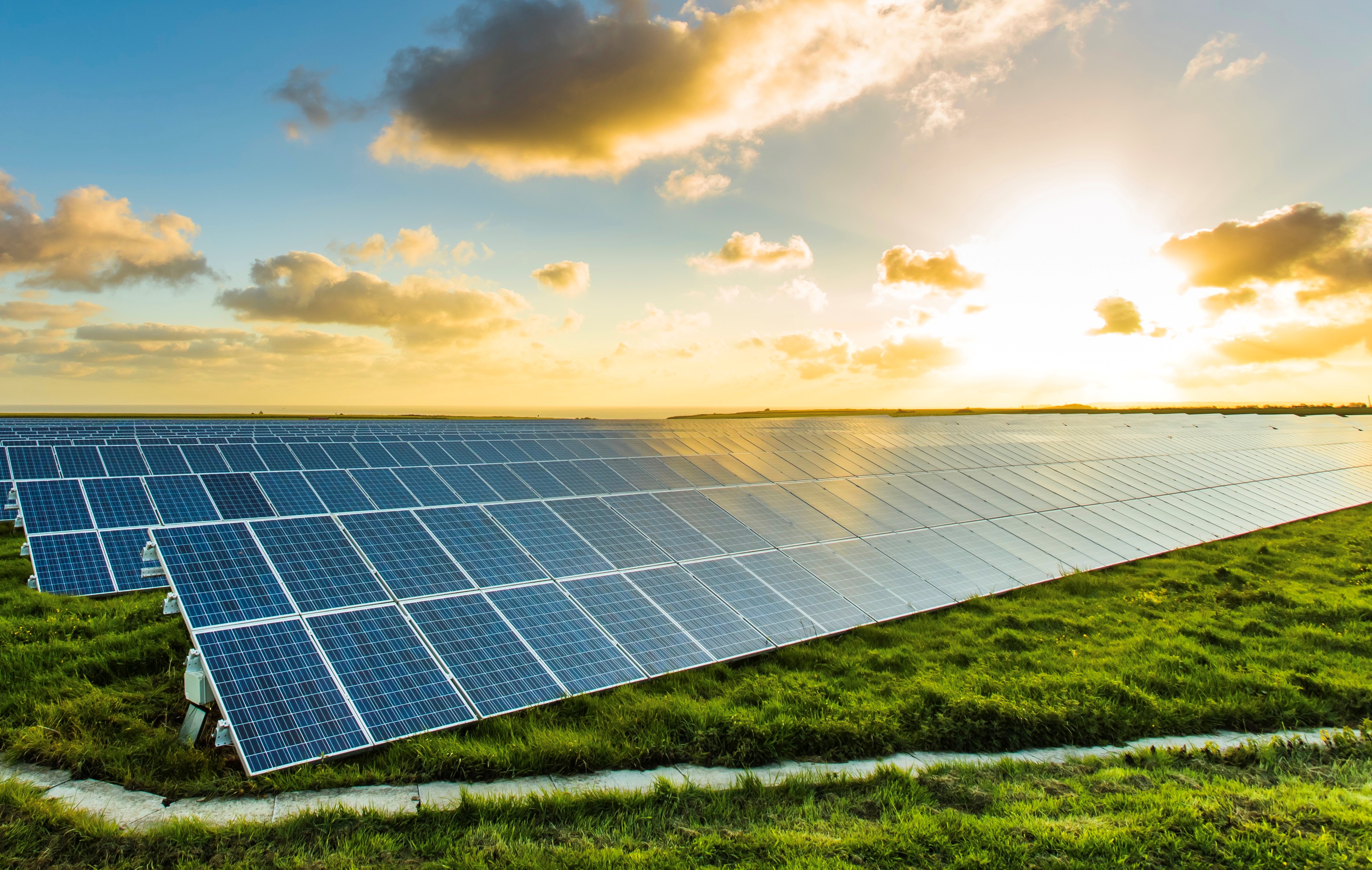 Solar farm with shining sun