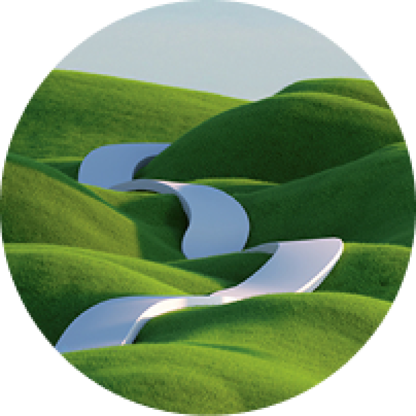 Winding path through hills of green grass